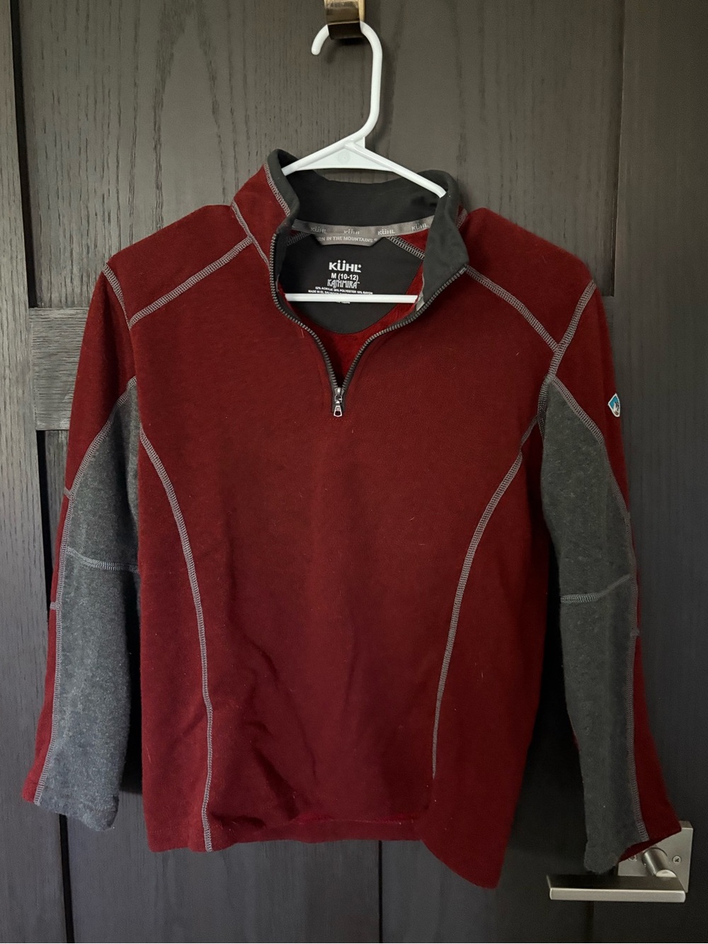 Kuhl kids Revel 1/4 zip pullover in maroon with grey side panels